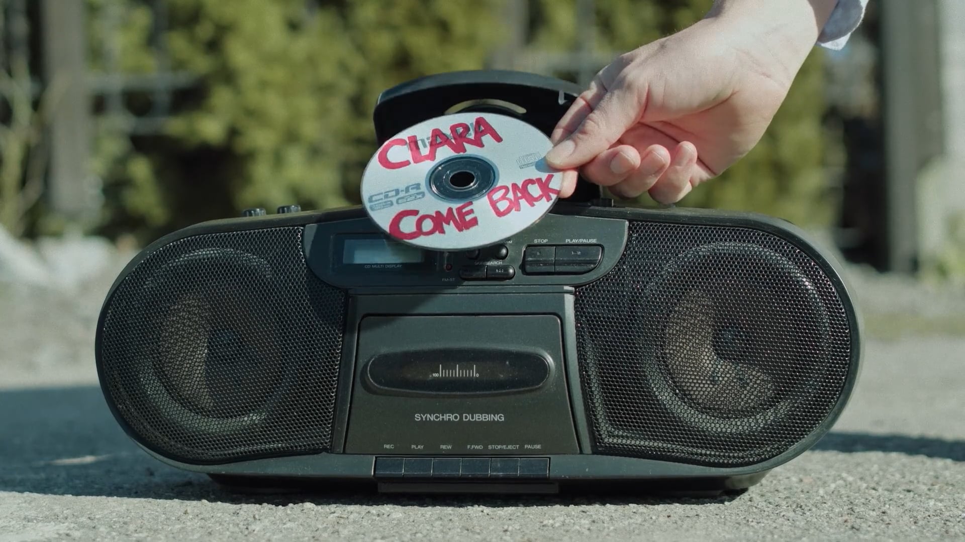 Boombox and a handwritten Clara Come Back CD